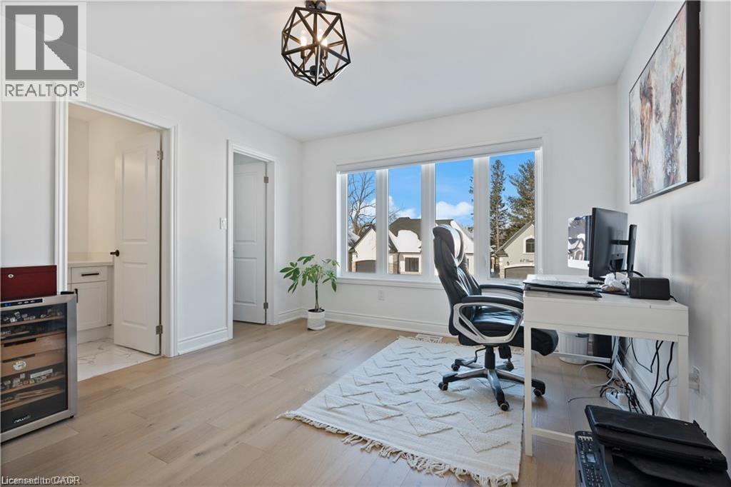 Office with beverage cooler and light wood-style floors - 66 Cesar Place, Ancaster, ON - Indoor Photo Showing Office