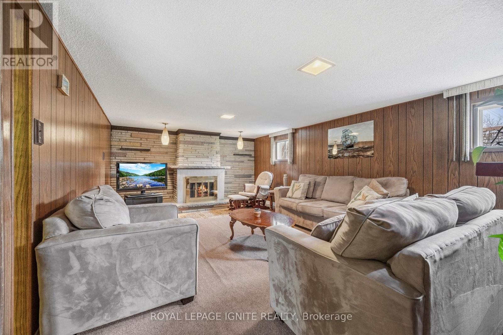 3746 Teeswater Road, Mississauga, ON - Indoor Photo Showing Living Room With Fireplace