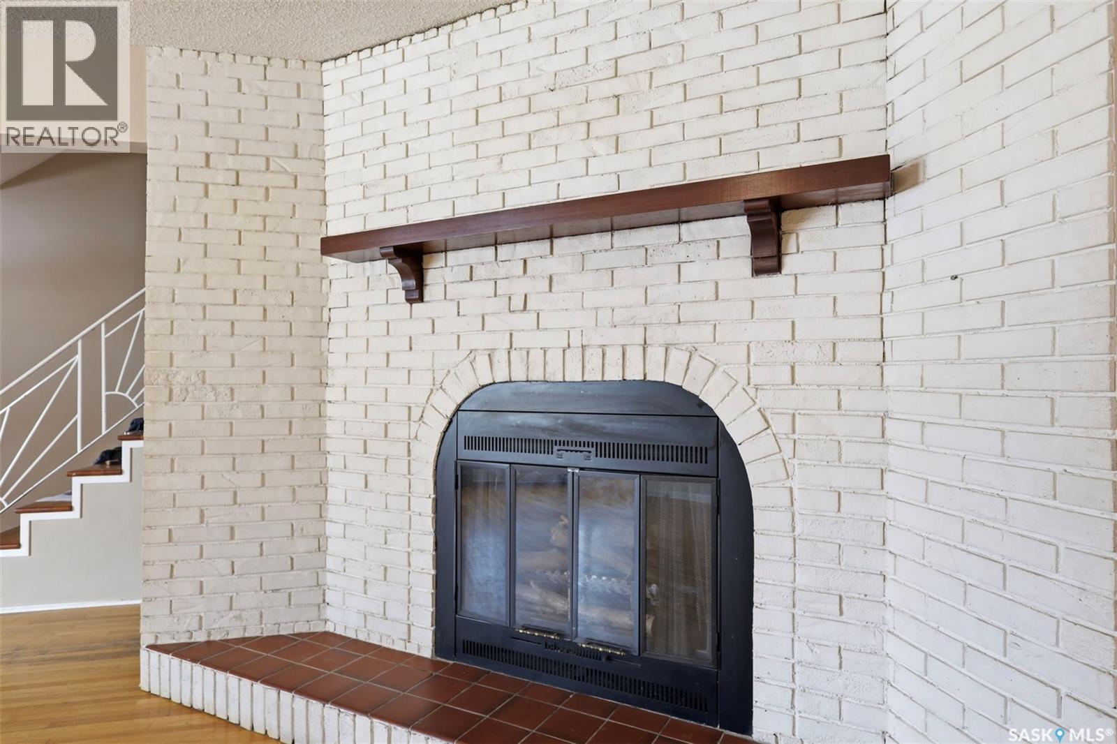 2610 Cascade Street, Saskatoon, SK - Indoor Photo Showing Other Room With Fireplace