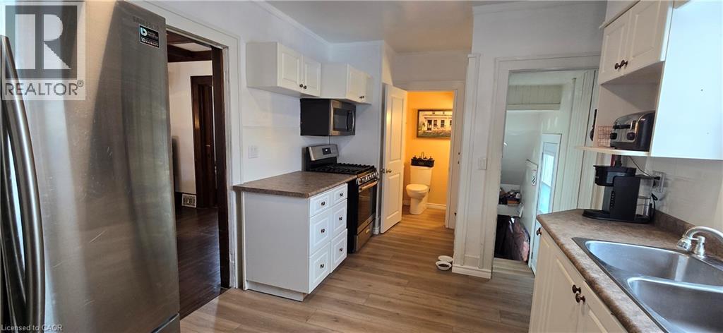 73 Talbot Street S, Simcoe, ON - Indoor Photo Showing Kitchen With Double Sink