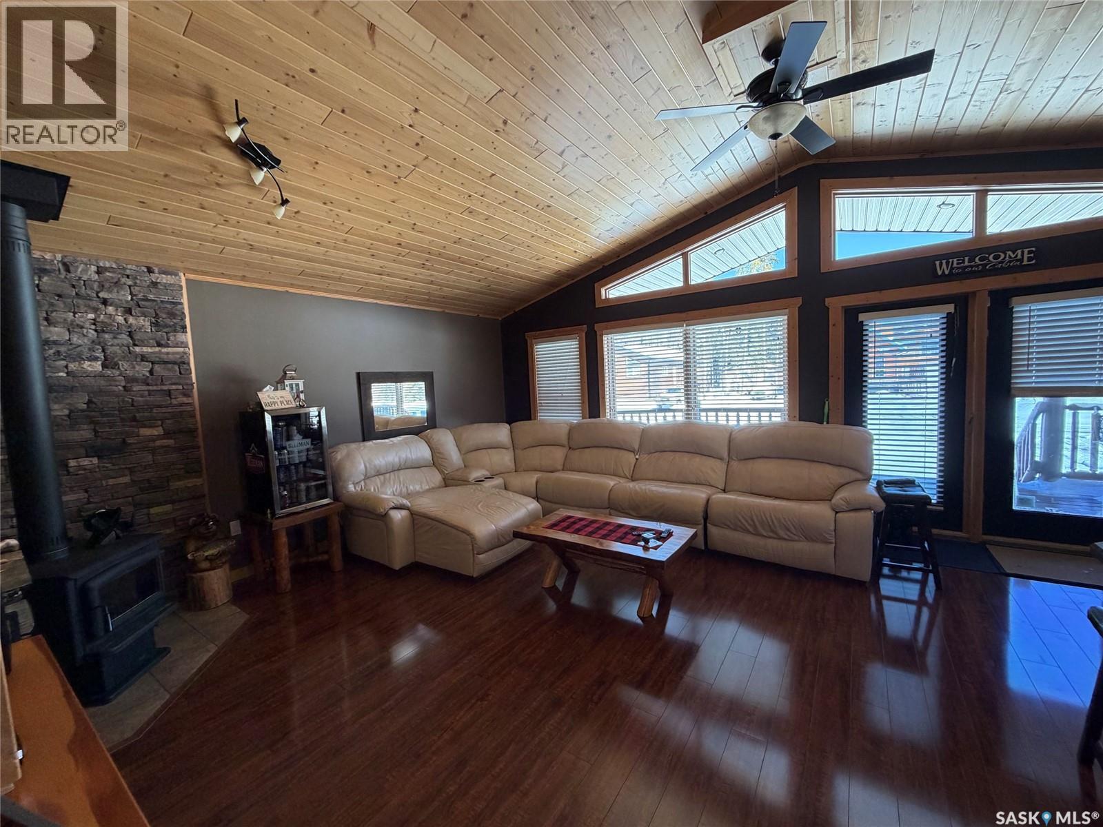 106 Sullivan Place, Chitek Lake, SK - Indoor Photo Showing Living Room With Fireplace