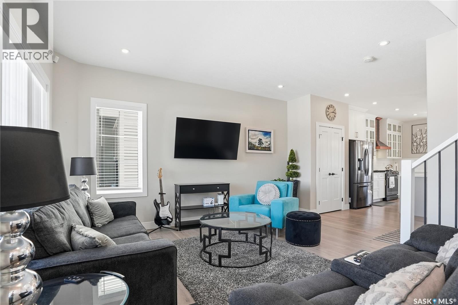 703 Underhill Lane, Saskatoon, SK - Indoor Photo Showing Living Room With Fireplace