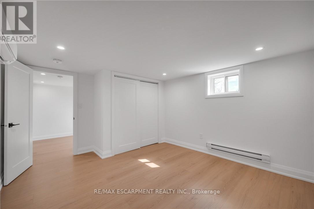 Bedroom with Heat Pump for Heating and Cooling - 1339 Augustine Drive, Burlington, ON - Indoor Photo Showing Other Room