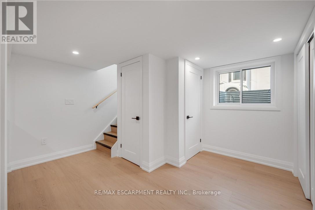 Entry way with storage and large windows - 1339 Augustine Drive, Burlington, ON - Indoor Photo Showing Other Room