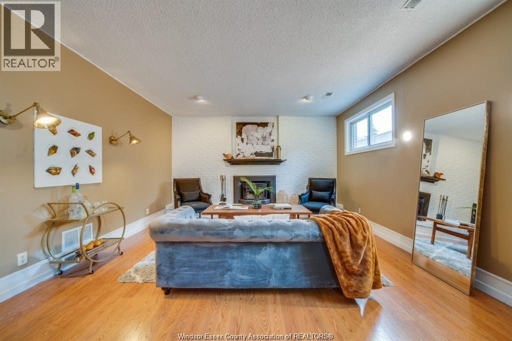 145 Centennial Drive, Tecumseh, ON - Indoor Photo Showing Living Room With Fireplace