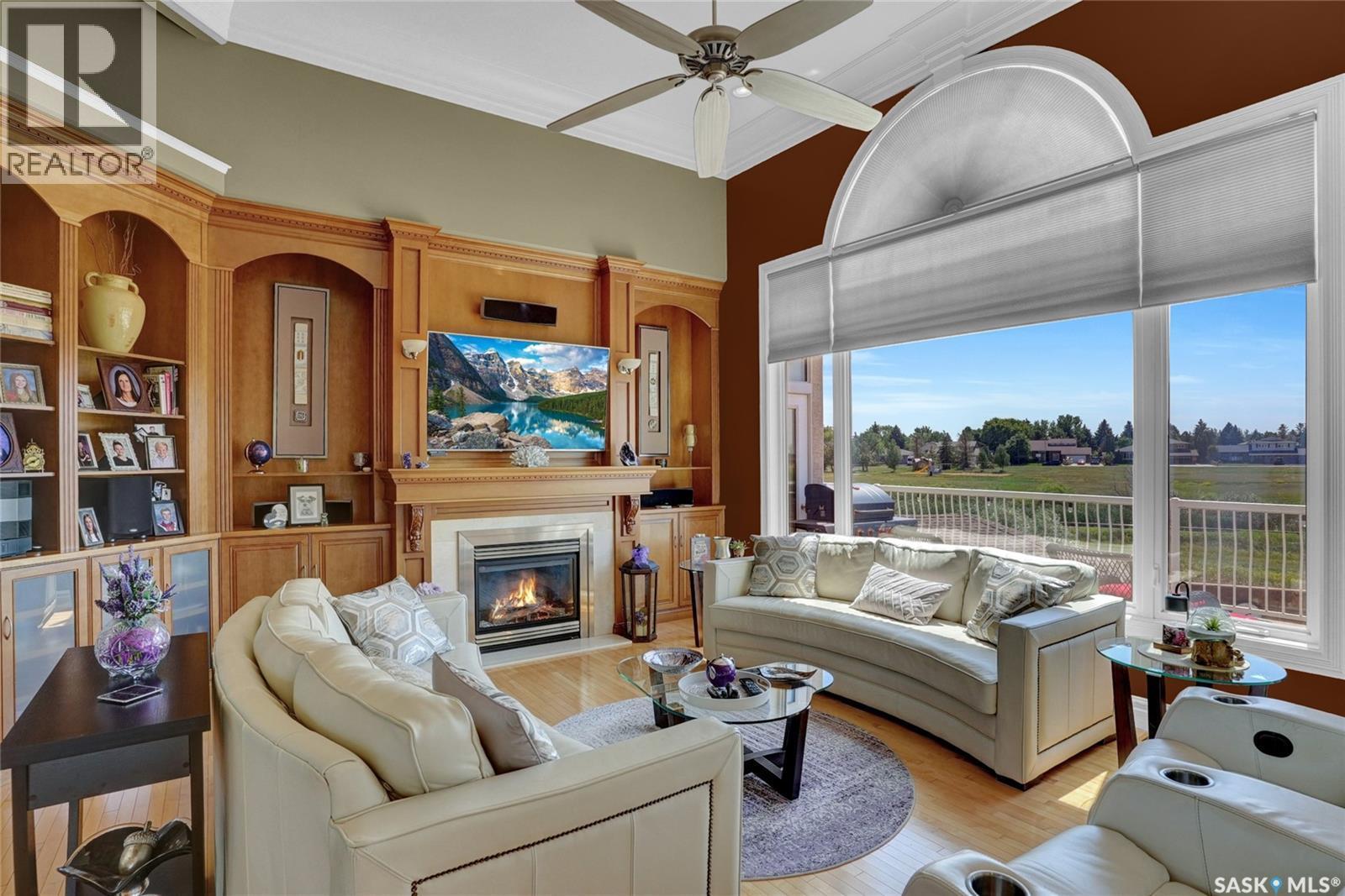 1453 Normandy Drive, Moose Jaw, SK - Indoor Photo Showing Living Room With Fireplace