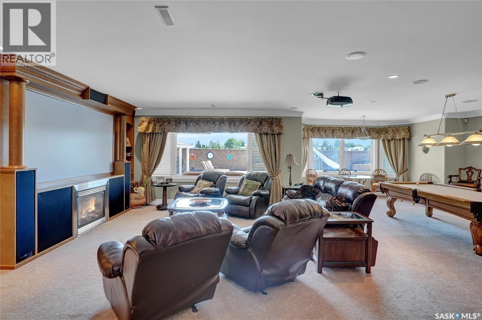 1453 Normandy Drive, Moose Jaw, SK - Indoor Photo Showing Living Room With Fireplace