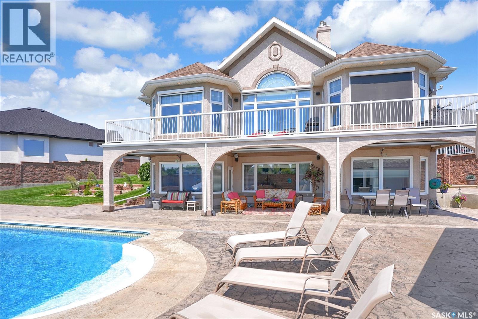 1453 Normandy Drive, Moose Jaw, SK - Outdoor With In Ground Pool With Deck Patio Veranda