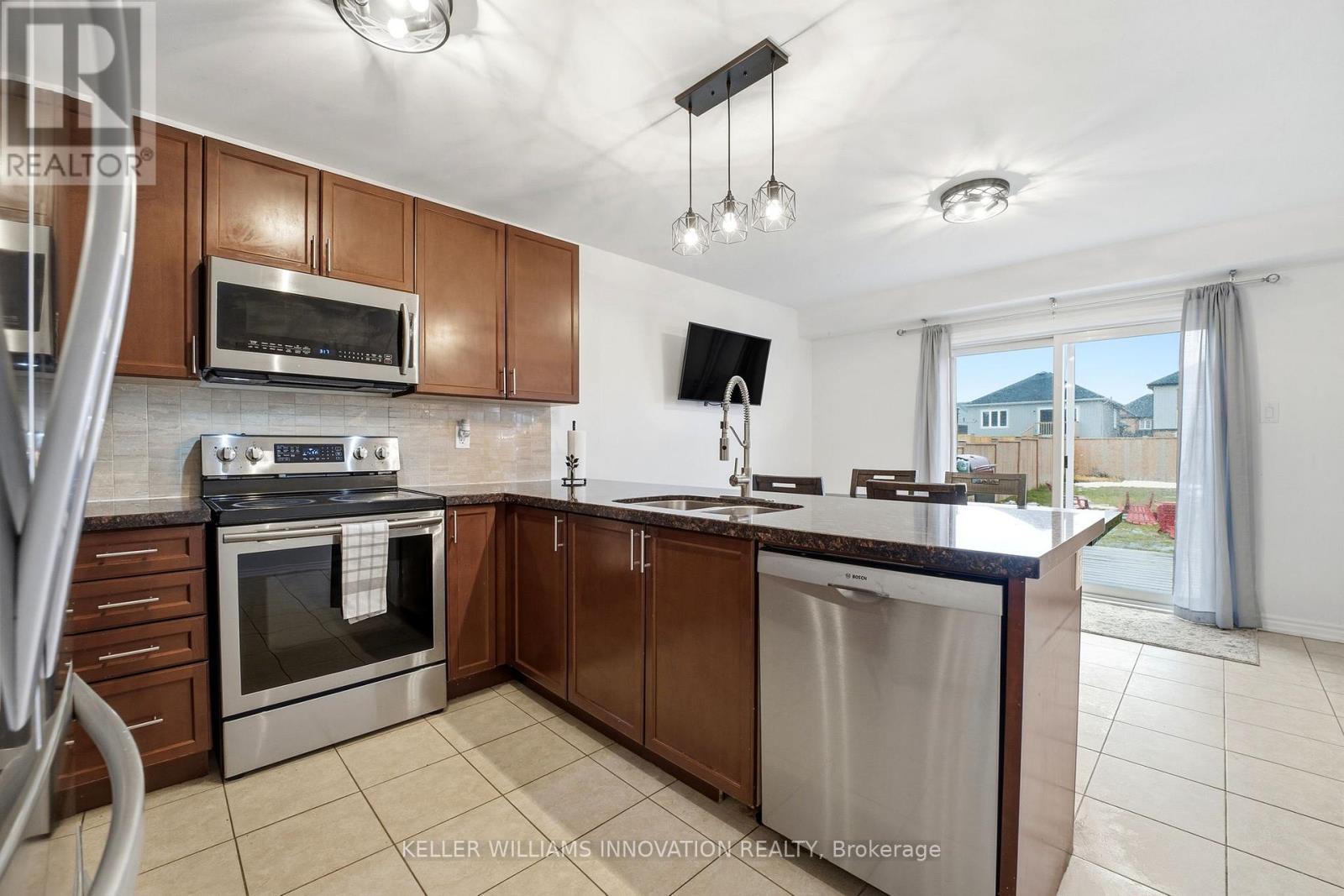 420 Armstrong Street W, North Perth, ON - Indoor Photo Showing Kitchen With Stainless Steel Kitchen