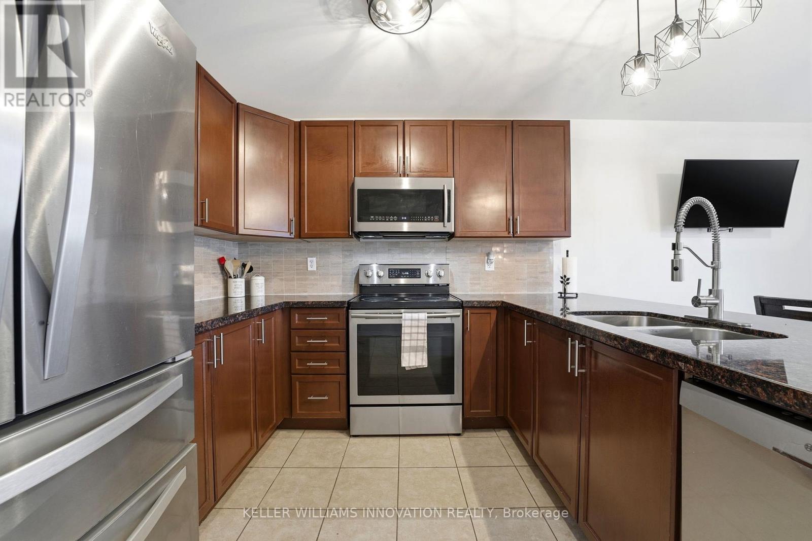 420 Armstrong Street W, North Perth, ON - Indoor Photo Showing Kitchen With Stainless Steel Kitchen With Double Sink