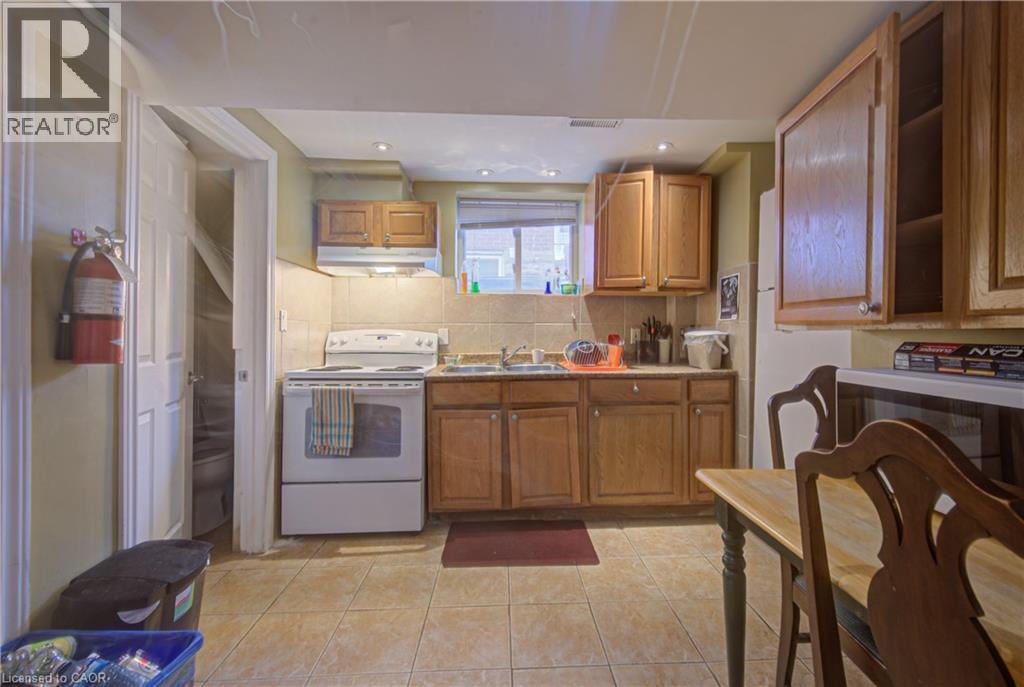 18 Norfolk Street N, Hamilton, ON - Indoor Photo Showing Kitchen With Double Sink