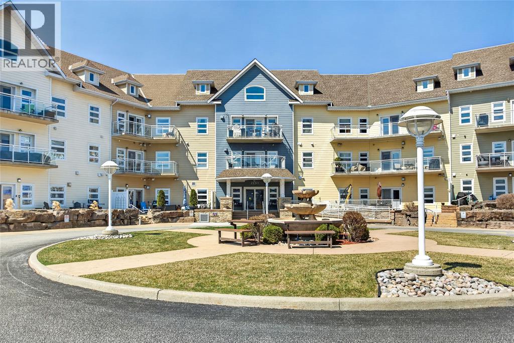 1550 Venetian Boulevard Unit# 310, Point Edward, ON - Outdoor With Balcony With Facade