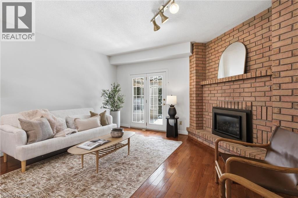 12 Sumner Crescent, Grimsby, ON - Indoor Photo Showing Living Room With Fireplace