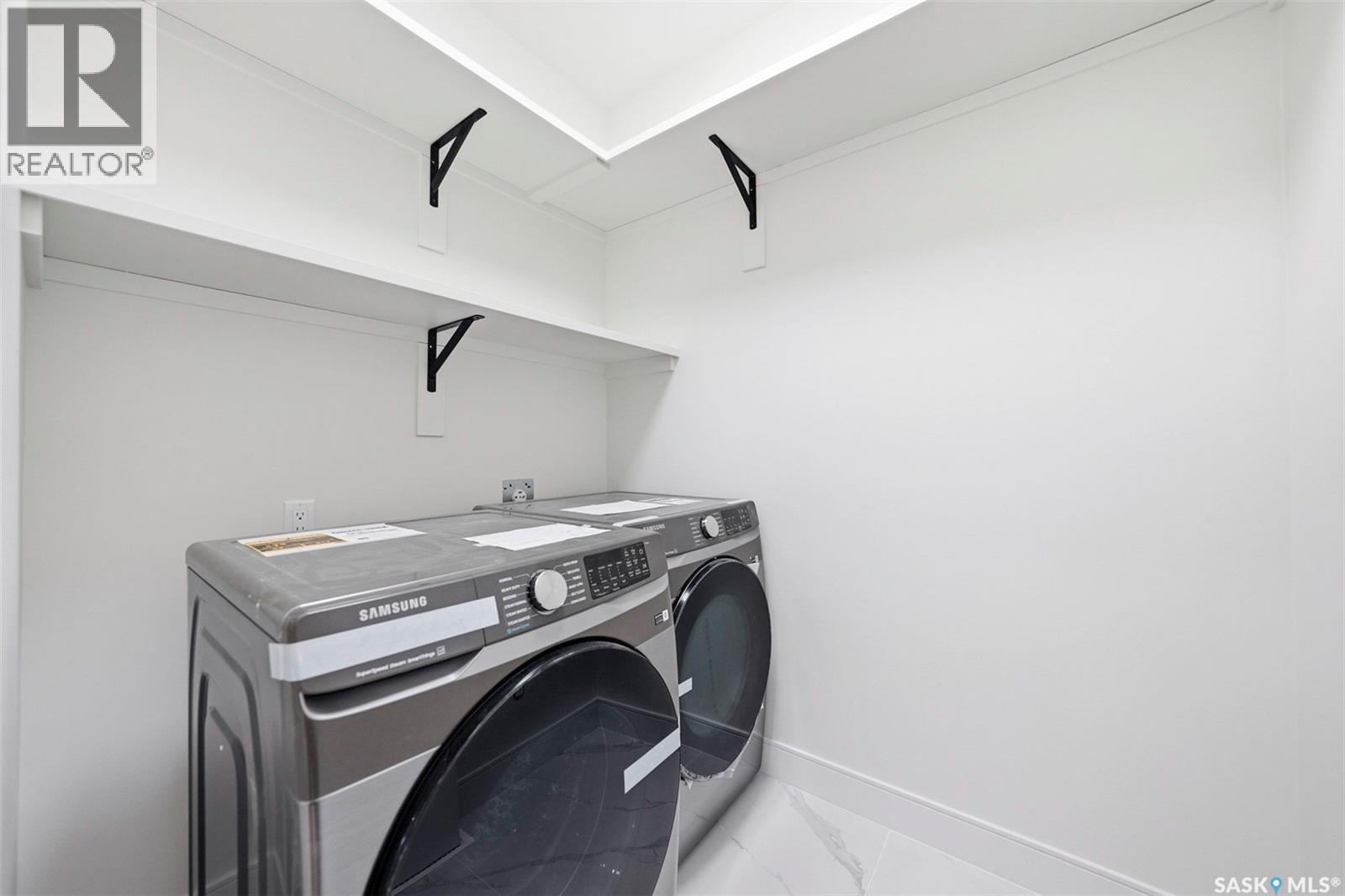 335 Sharma Crescent, Saskatoon, SK - Indoor Photo Showing Laundry Room