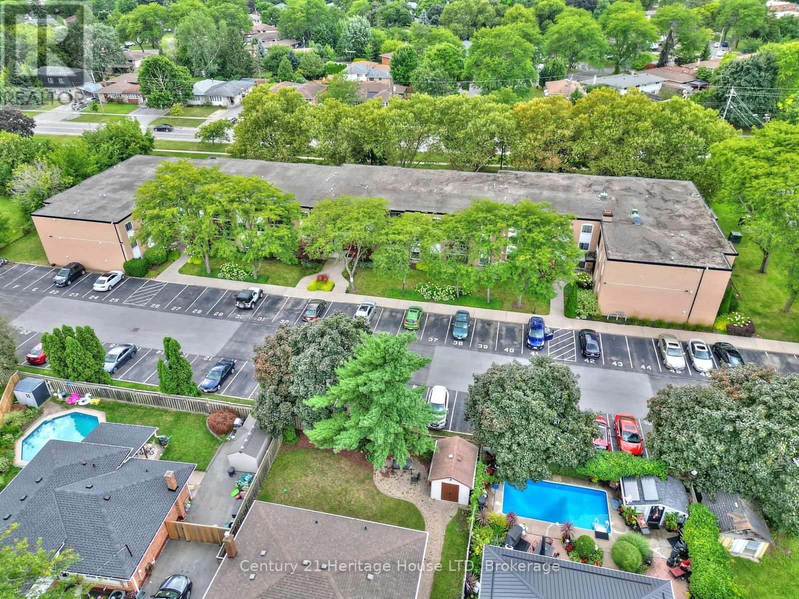 Close to the Lake and Port Dalhousie! - 307 - 6 Westlake Lane, St. Catharines (Lakeport), ON - Outdoor With In Ground Pool