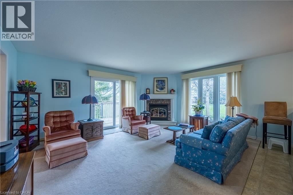 93 Elmhurst Avenue Unit# 8, Simcoe, ON - Indoor Photo Showing Living Room With Fireplace