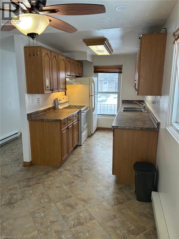 Kitchen featuring wood-finish cabinetry and countertops - 744 Parkview Crescent, Cambridge, ON - Indoor Photo Showing Kitchen