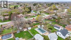 Aerial perspective showcasing a residential neighborhood with a variety of single-story homes - 