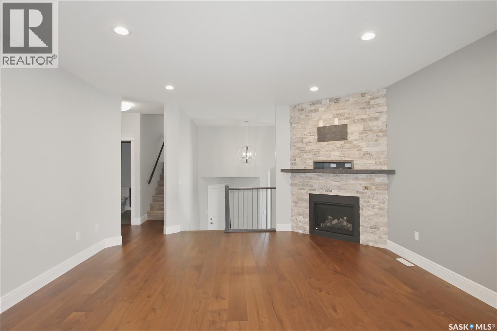 551 6Th Avenue Se, Swift Current, SK - Indoor Photo Showing Living Room With Fireplace