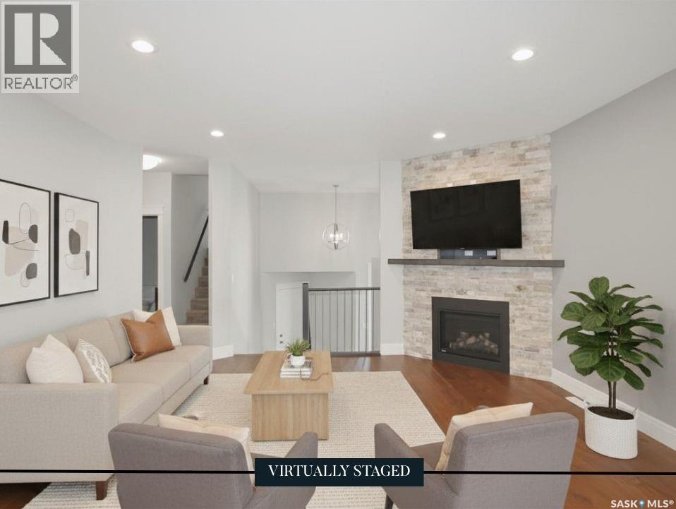 551 6Th Avenue Se, Swift Current, SK - Indoor Photo Showing Living Room With Fireplace