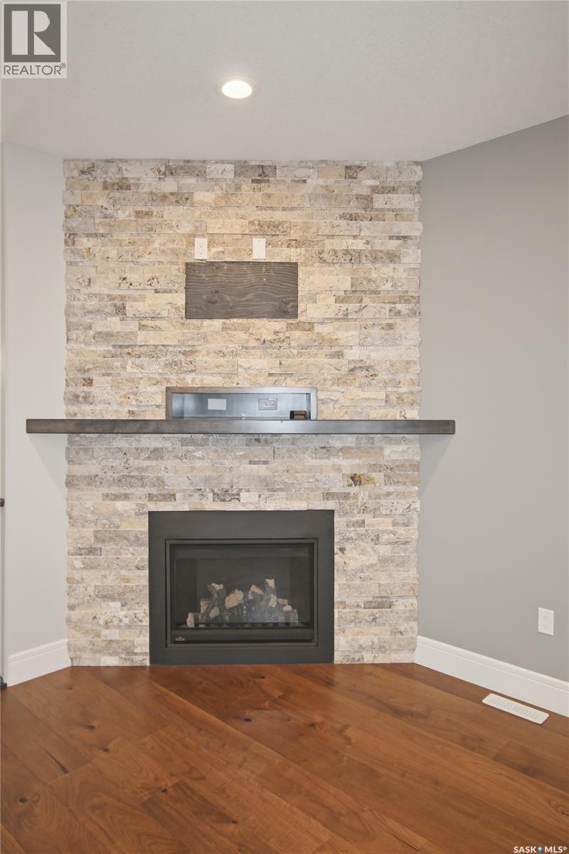 551 6Th Avenue Se, Swift Current, SK - Indoor Photo Showing Living Room With Fireplace