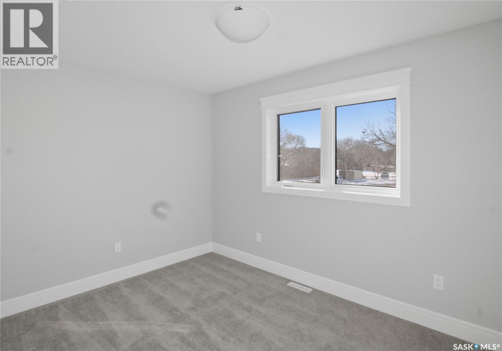 551 6Th Avenue Se, Swift Current, SK - Indoor Photo Showing Other Room