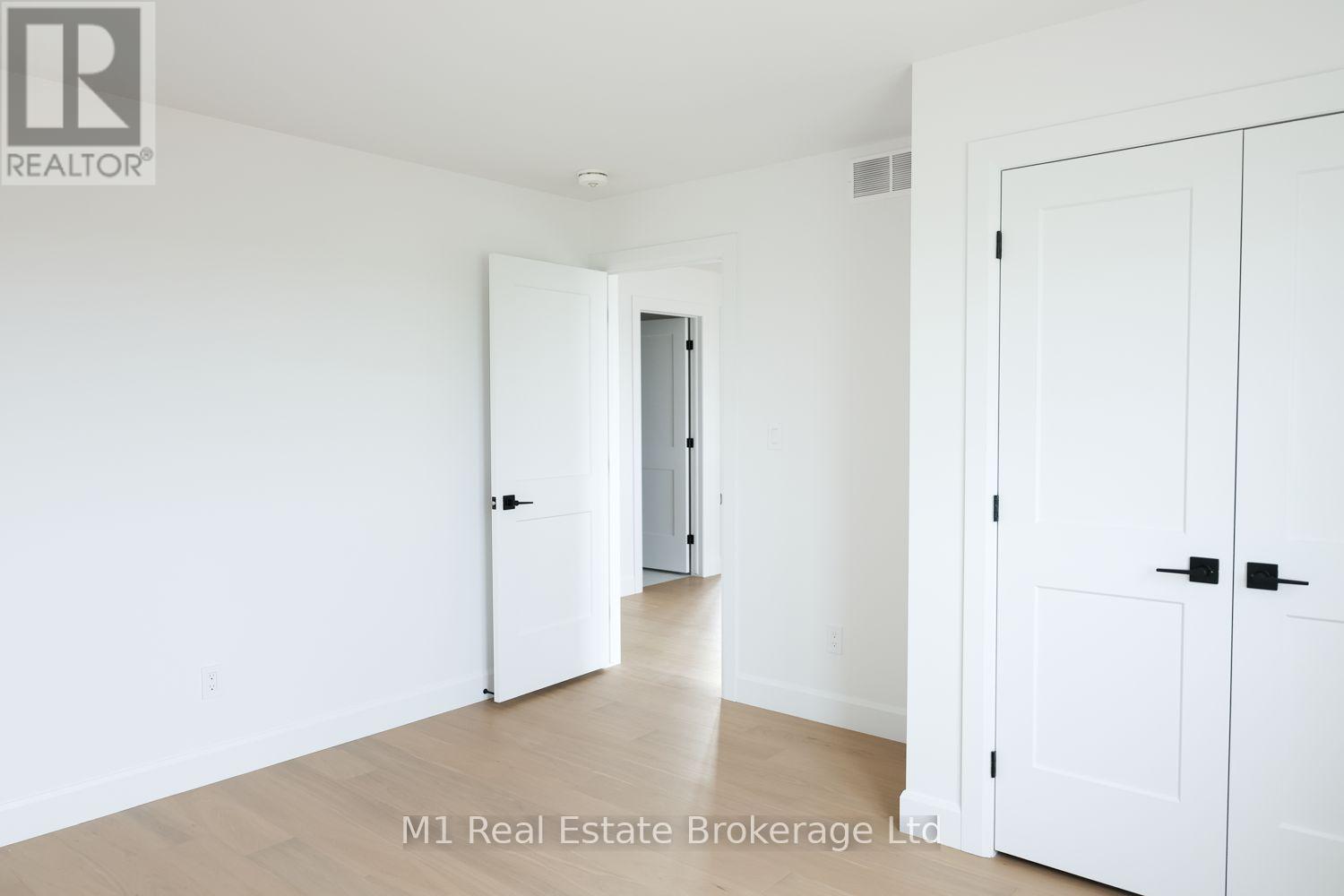 74 Bedell Drive, Mapleton, ON - Indoor Photo Showing Other Room