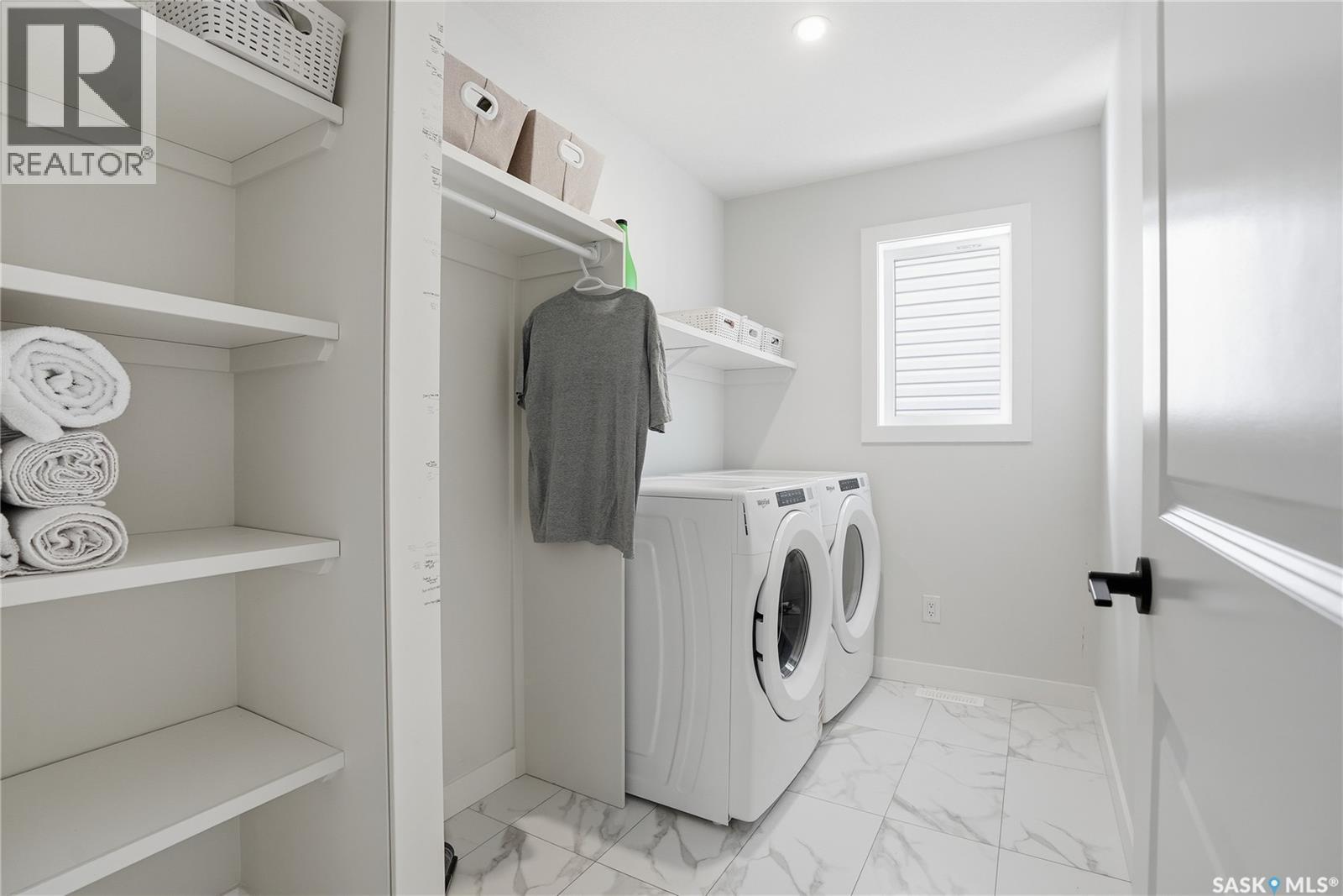 606 Delainey Road, Saskatoon, SK - Indoor Photo Showing Laundry Room