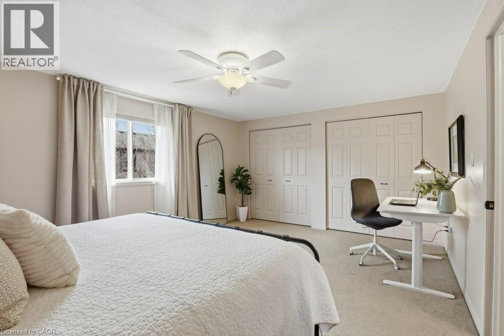 Large master bedroom with dual closets - 42 Fallowfield Drive Unit# 15, Kitchener, ON - Indoor Photo Showing Bedroom