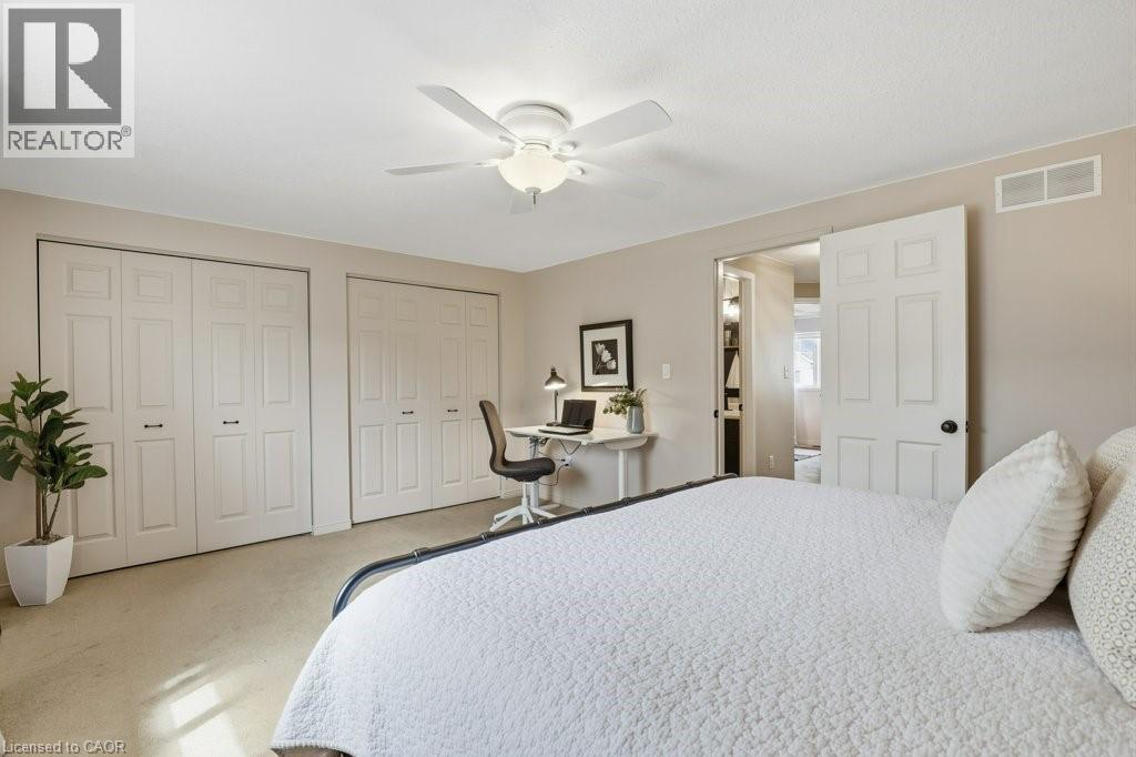 Large master bedroom with dual closets - 42 Fallowfield Drive Unit# 15, Kitchener, ON - Indoor Photo Showing Bedroom