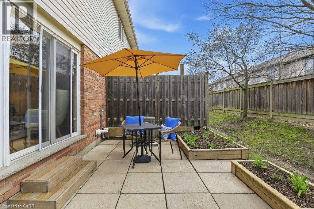 Your own backyard oasis - 42 Fallowfield Drive Unit# 15, Kitchener, ON - Outdoor With Deck Patio Veranda With Exterior
