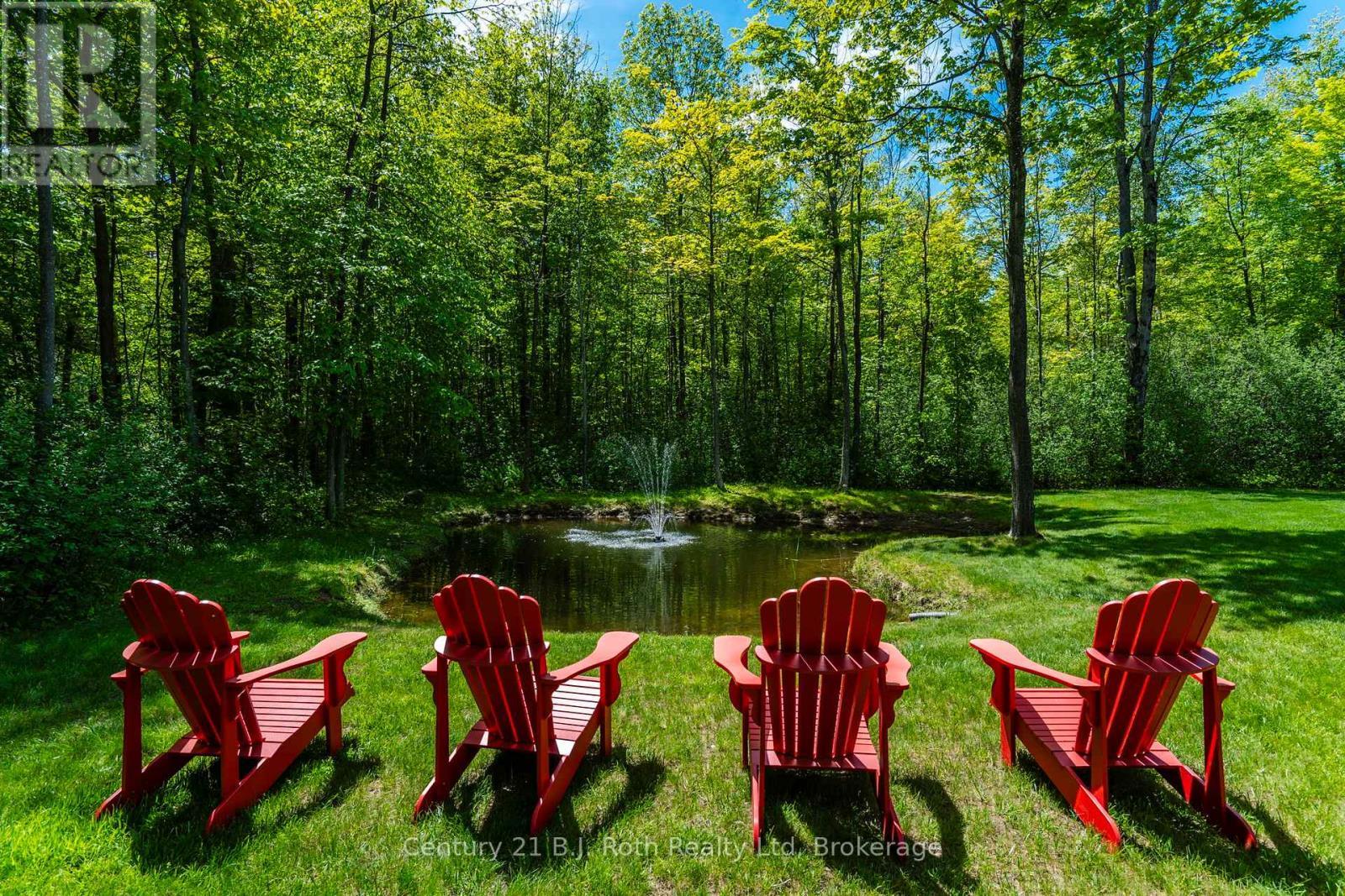 BACKYARD PRIVATE POND - 291 Concession Road 8 E, Tiny, ON - Indoor Photo Showing Garage