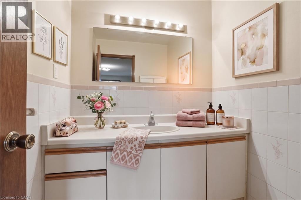 Virtually Staged - 60 Rexford Drive, Hamilton, ON - Indoor Photo Showing Bathroom