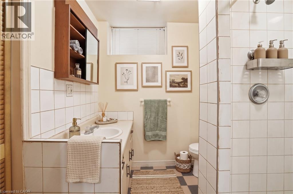 Virtually Staged - 60 Rexford Drive, Hamilton, ON - Indoor Photo Showing Bathroom