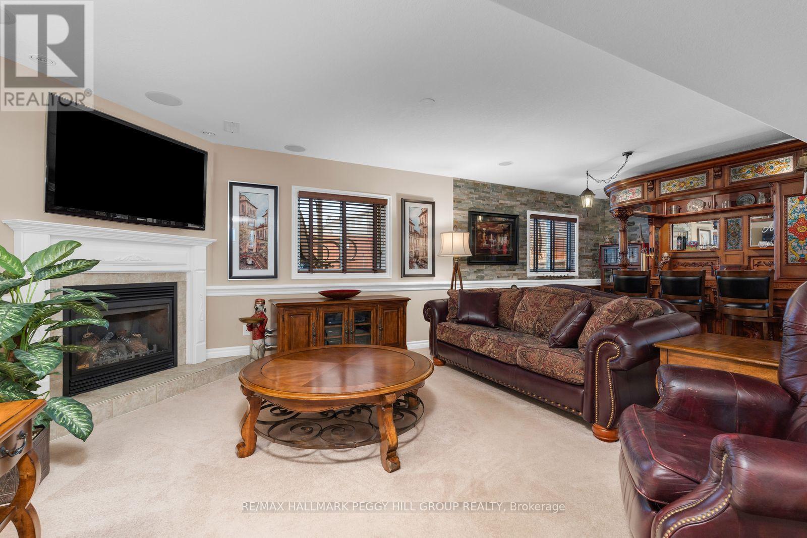 11 Red Cedar Lane, Essa, ON - Indoor Photo Showing Living Room With Fireplace
