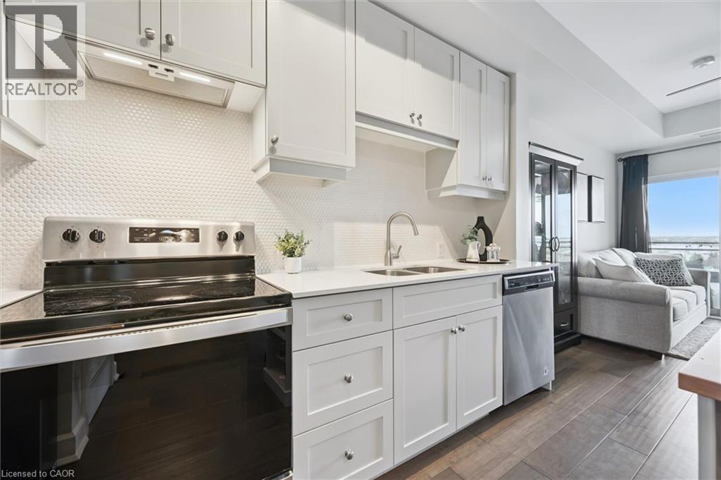 255 Northfield Drive E Unit# 610, Waterloo, ON - Indoor Photo Showing Kitchen With Double Sink