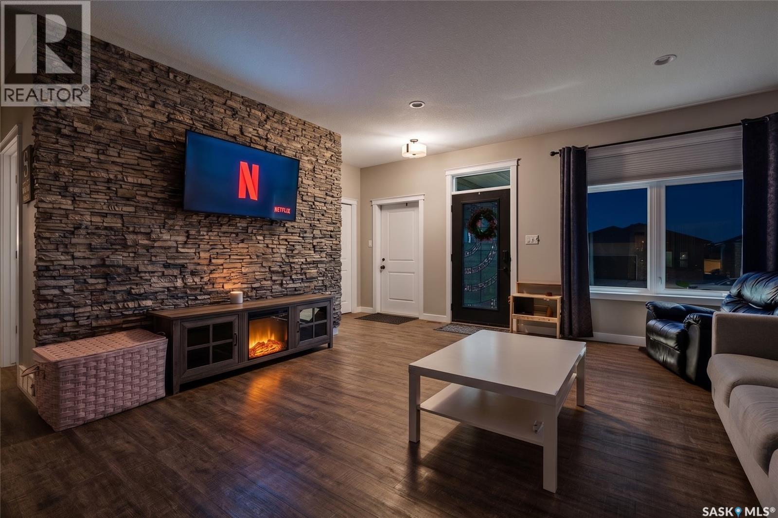 1181 Meier Drive, Moose Jaw, SK - Indoor Photo Showing Living Room With Fireplace