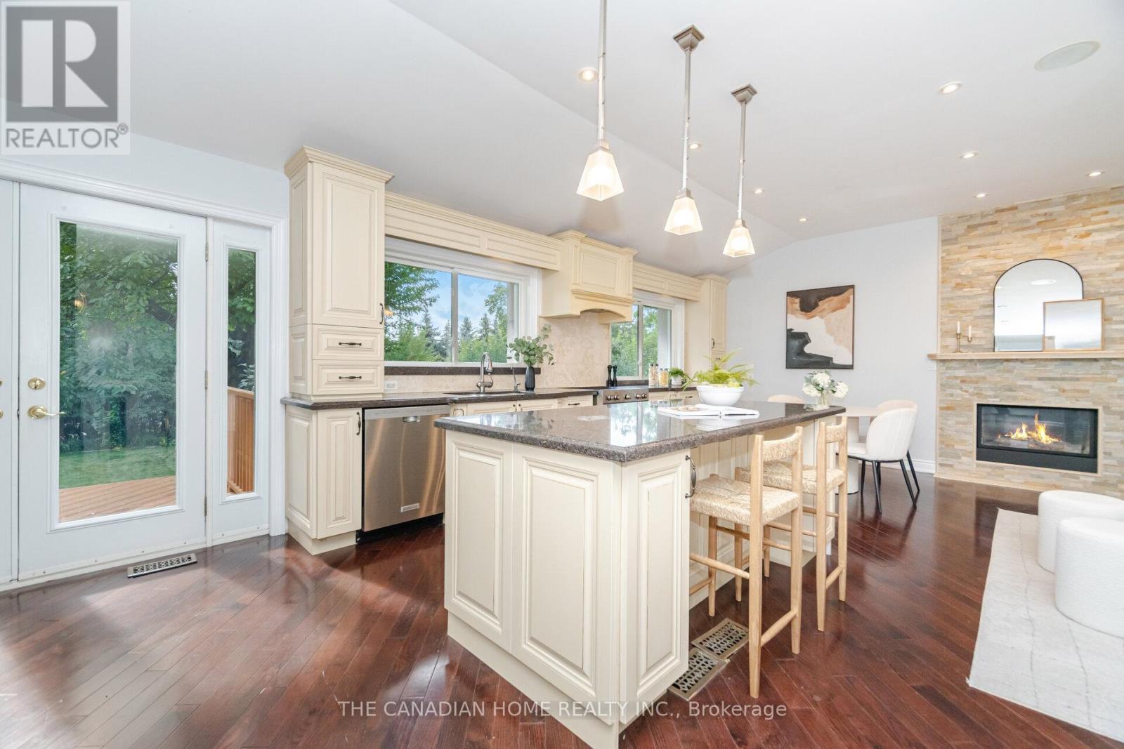 207 Penn Drive, Burlington, ON - Indoor Photo Showing Kitchen With Fireplace With Upgraded Kitchen
