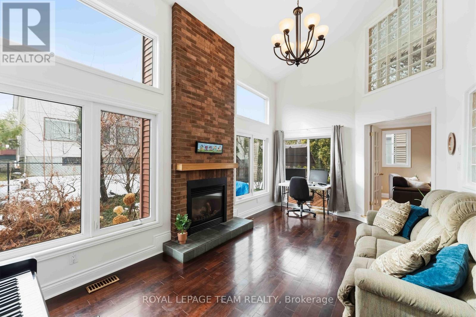 19 Hackett Street, Ottawa, ON - Indoor Photo Showing Living Room With Fireplace
