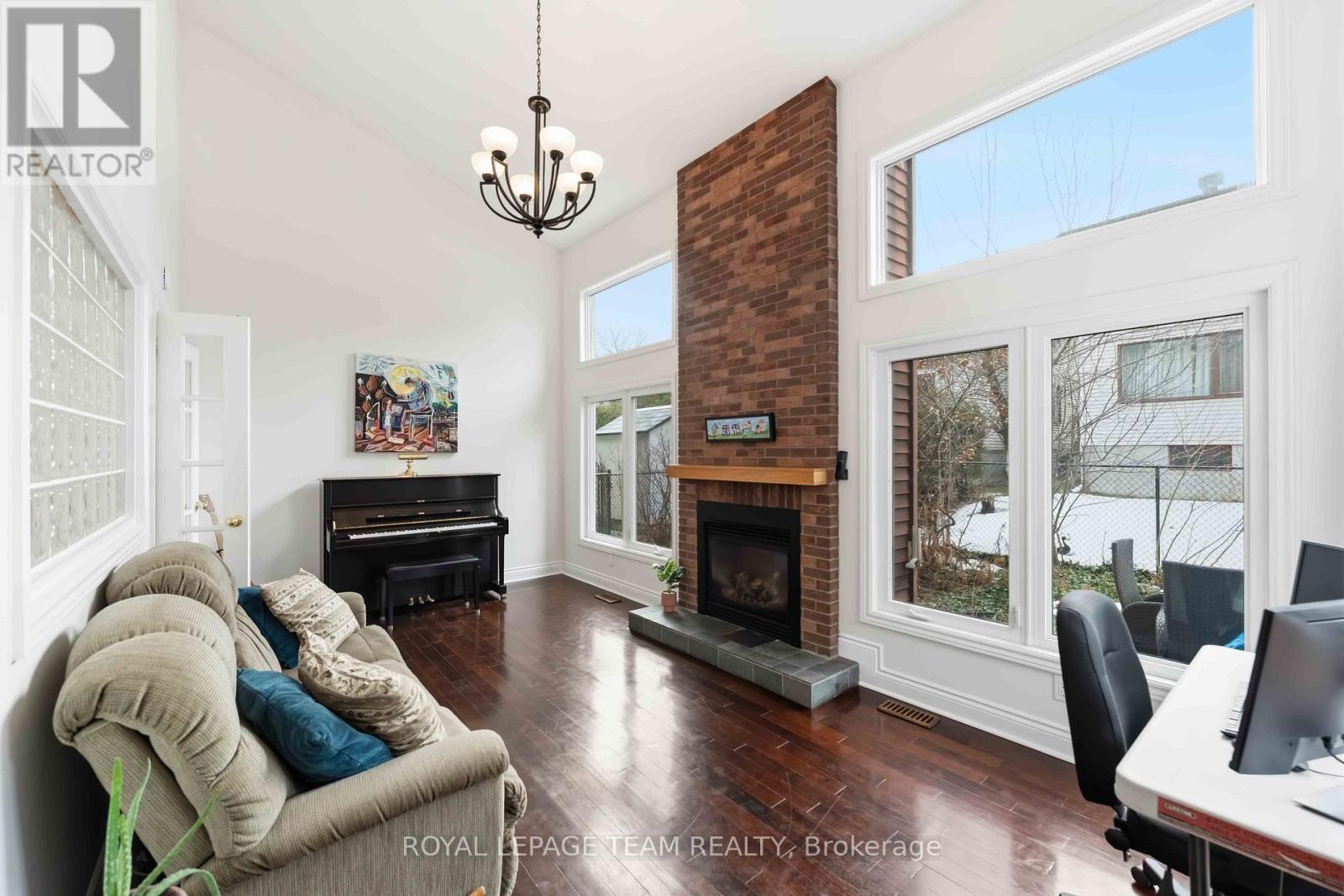 19 Hackett Street, Ottawa, ON - Indoor Photo Showing Living Room With Fireplace