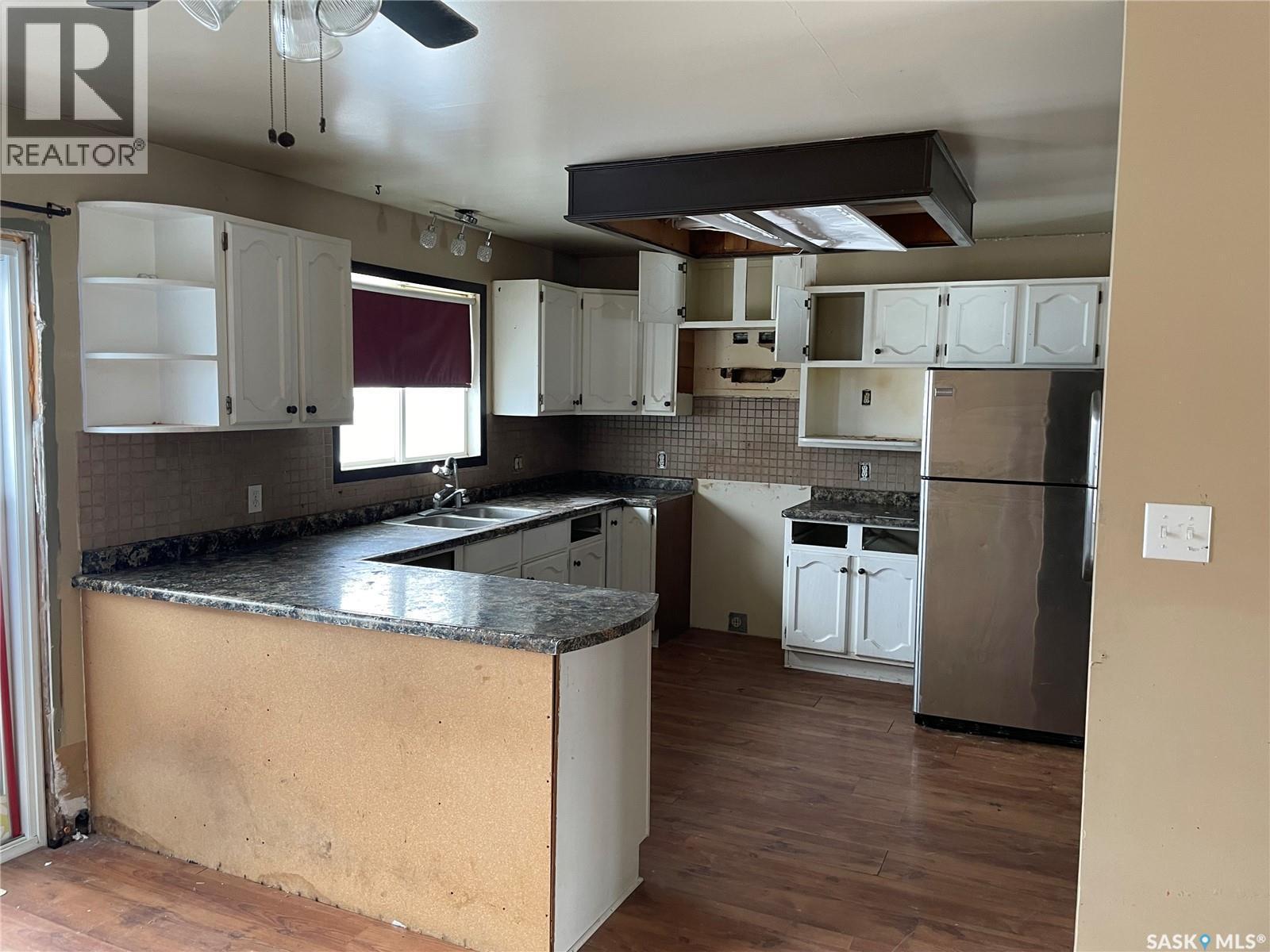 137 1St Street W, Pierceland, SK - Indoor Photo Showing Kitchen With Double Sink