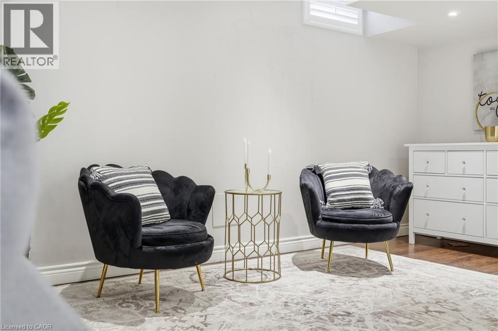 White walls with a window featuring white plantation shutters - 47 Winners Way, Binbrook, ON - Indoor