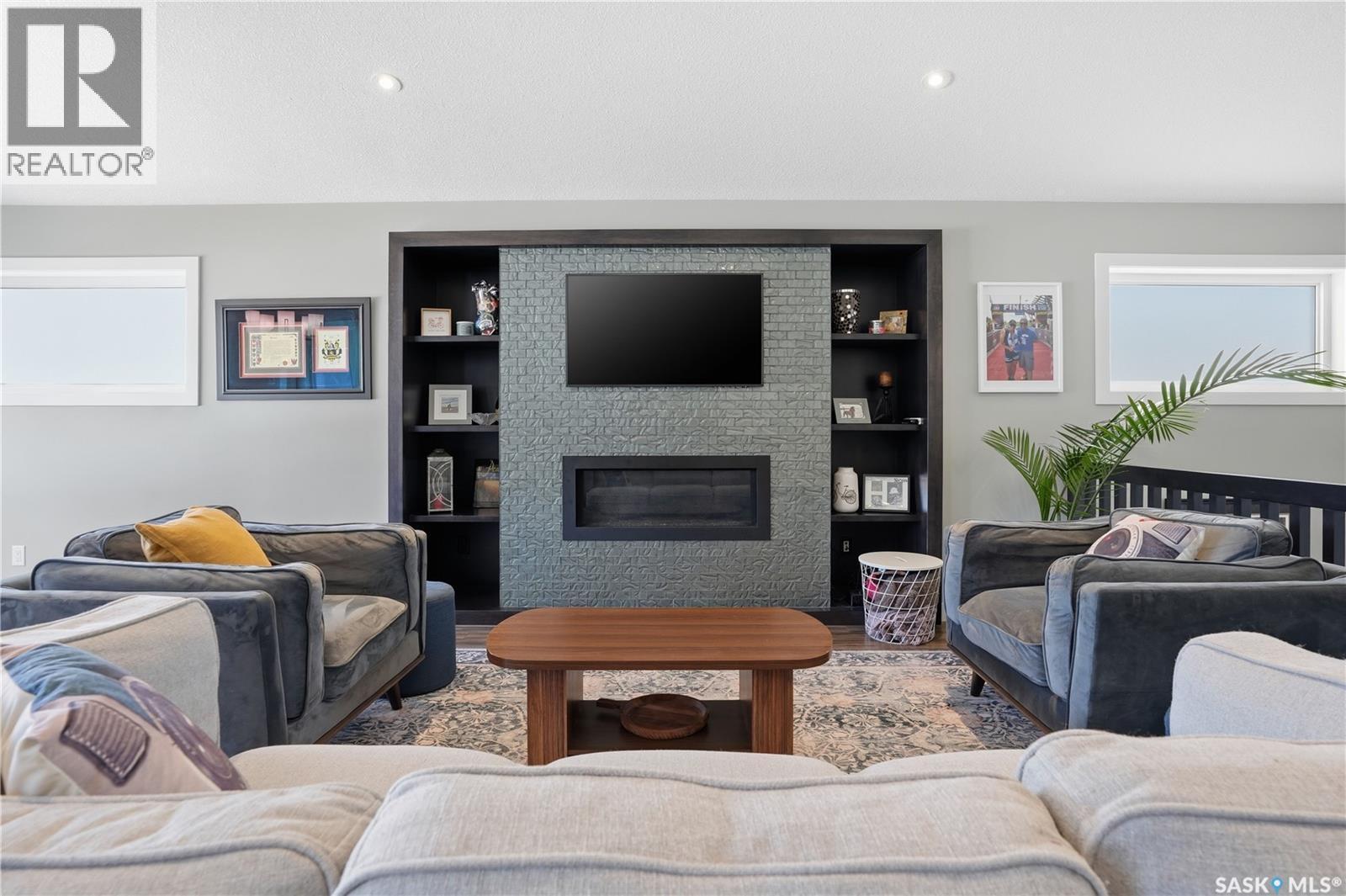 313 Prairie View Drive, Regina, SK - Indoor Photo Showing Living Room With Fireplace