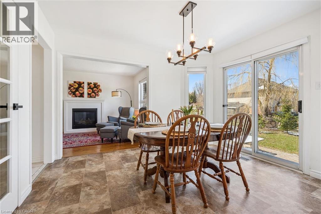 304 Daniel Crescent, Elora, ON - Indoor Photo Showing Dining Room With Fireplace