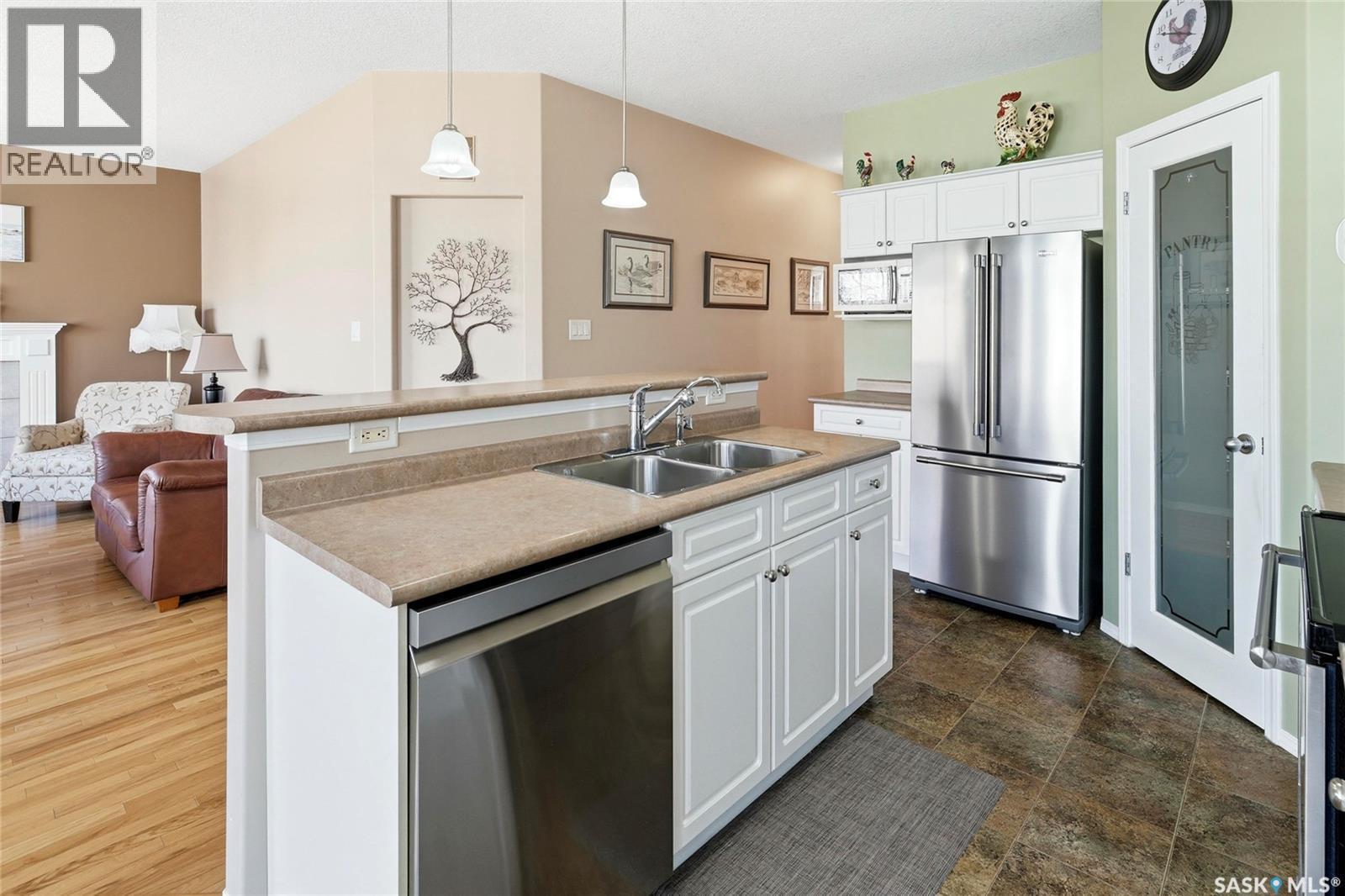 1655 Wingert Drive, Regina, SK - Indoor Photo Showing Kitchen With Stainless Steel Kitchen With Double Sink
