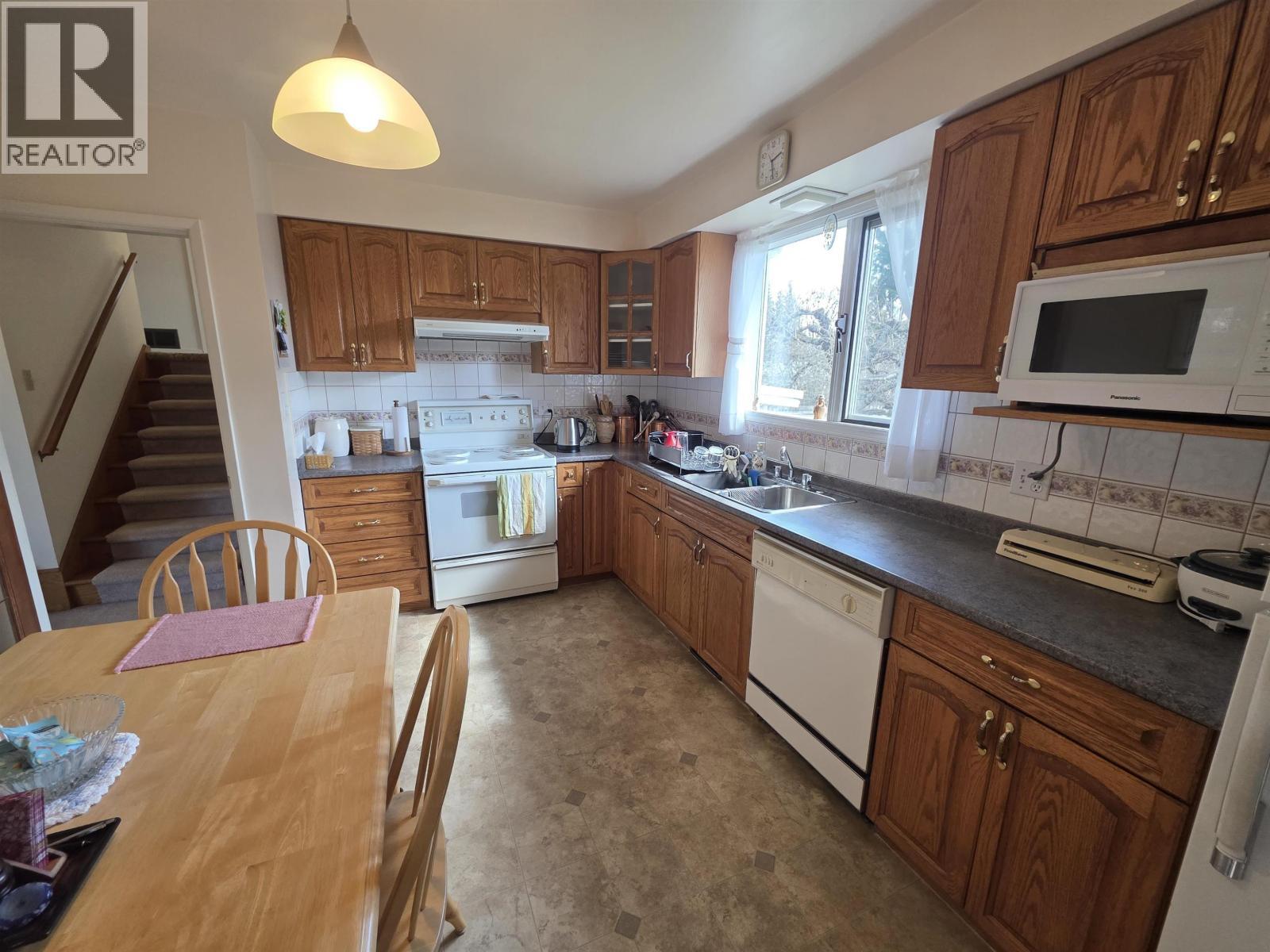 4815 Davis Avenue, Terrace, BC - Indoor Photo Showing Kitchen With Double Sink