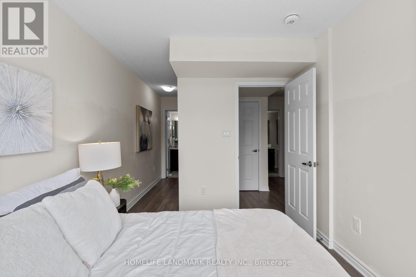 214 - 1085 Danforth Road, Toronto, ON - Indoor Photo Showing Bedroom