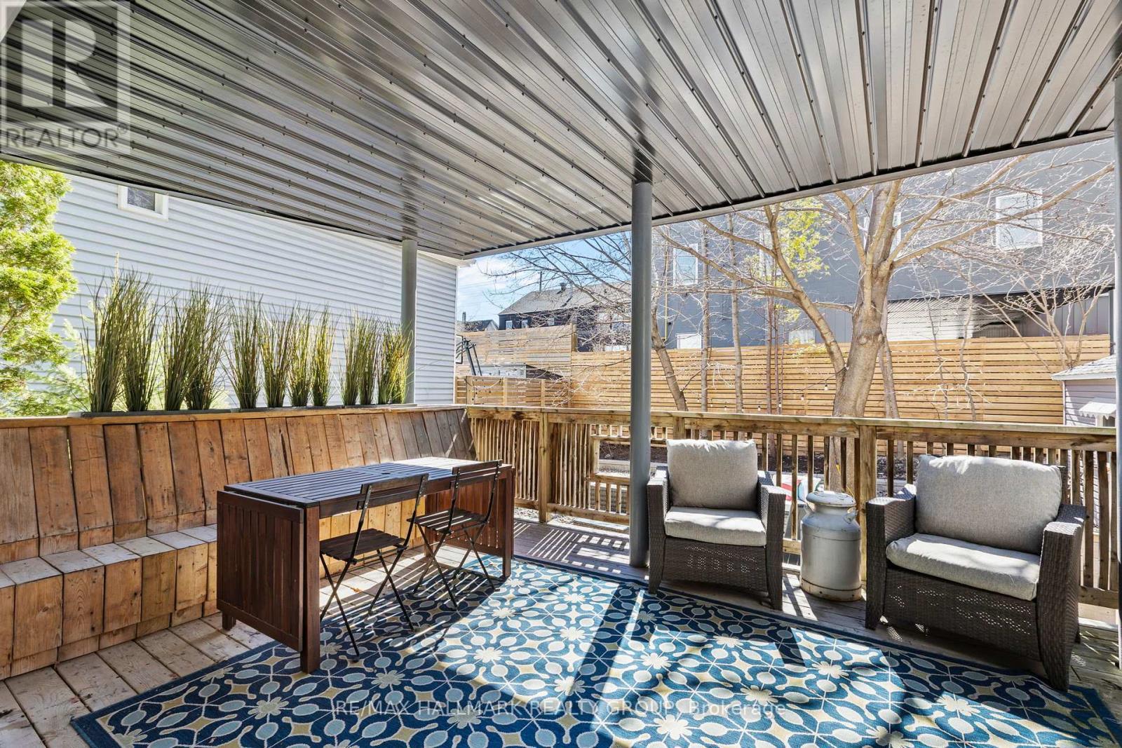 Private, fully covered deck patio off kitchen - 330 Winona Avenue, Ottawa, ON - Outdoor With Deck Patio Veranda With Exterior