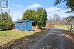 Solid wooden storage shed along Rideau Street -