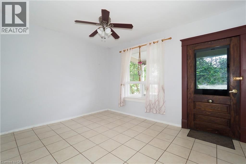 Light-toned square tile flooring throughout - 205 Duke Street E, Kitchener, ON - Indoor Photo Showing Other Room